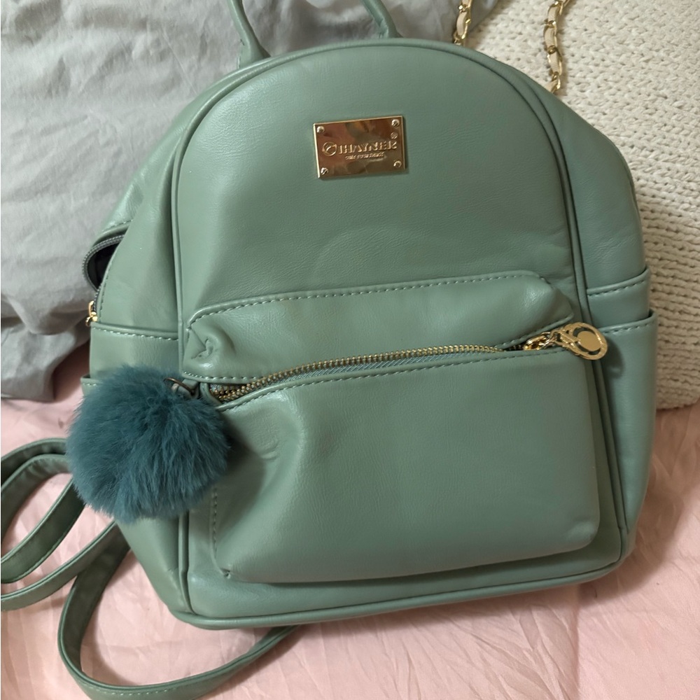 Charming Charlie Mint Backpack with Gold Accents